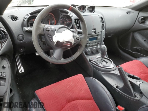 2016 Nissan 370Z Sport z VIN JN1AZ4EH4GM931560, wystawiony jako Copart lot #88990035 z przebiegiem Nie podano mil oraz Czysty tytuł • Clean title. Historia ofert i sprzedaży dostępna na DreamBid. Obrazek 8.