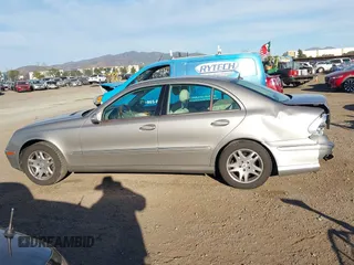 2005 Mercedes-Benz E-Class 3.2L with VIN WDBUF65J05A646577, listed as a IAAI auction lot 41666861 with 106,012 mi miles. Bid and sale history available at carsss.com. Image 14.