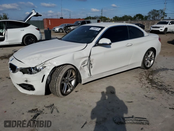 2016 BMW 4 Series 428i with VIN WBA3V7C57G5A27594, listed as a Copart auction lot 87968815 with 55,058 mi miles and Salvage title. Bid and sale history available at DreamBid. Image 1.