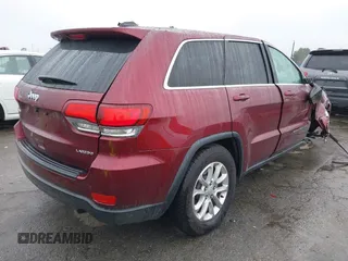 2021 Jeep Grand Cherokee Laredo X with VIN 1C4RJEAG4MC681989, listed as a IAAI auction lot 41571341 with 61,090 mi miles and . Bid and sale history available at DreamBid. Image 4.