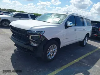 2023 Chevrolet Suburban Premier with VIN 1GNSCFKD9PR387180, listed as a IAAI auction lot 40433867 with 40,936 mi miles. Bid and sale history available at carsss.com. Image 2.