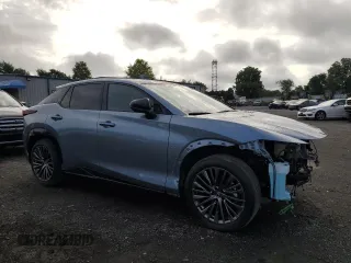 2023 Lexus RZ with VIN JTJAAAAB0PA011699, listed as a Copart auction lot 65108714 with 12,365 mi miles and Salvage Title. Bid and sale history available at carsss.com. Image 4.