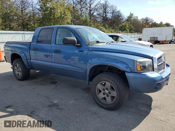 2005 Dodge Dakota Laramie with VIN 1D7HW58N25S200250, listed as a Copart auction lot 74635094 with 230,871 mi miles and Clean Title. Bid and sale history available at DreamBid. Image 4.
