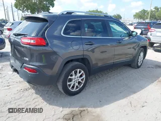 2016 Jeep Cherokee Latitude z VIN 1C4PJMCS1GW367447, wystawiony jako IAAI lot #42367643 z przebiegiem 151 072 mil mil oraz . Historia ofert i sprzedaży dostępna na DreamBid. Obrazek 4.