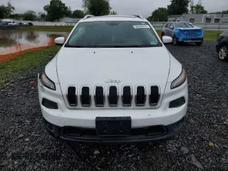 2015 Jeep Cherokee Latitude z VIN 1C4PJMCSXFW739396, wystawiony jako Copart lot #56282915 z przebiegiem 114 309 mil mil oraz Szkoda całkowita • Salvage title. Historia ofert i sprzedaży dostępna na DreamBid. Obrazek 5.