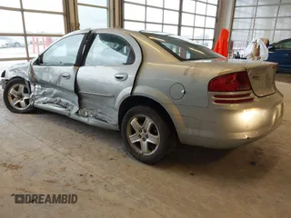 2002 Dodge Stratus z VIN 1B3EL56R42N276530, wystawiony jako IAAI lot #41726024 z przebiegiem 150 610 mil mil oraz . Historia ofert i sprzedaży dostępna na DreamBid. Obrazek 3.