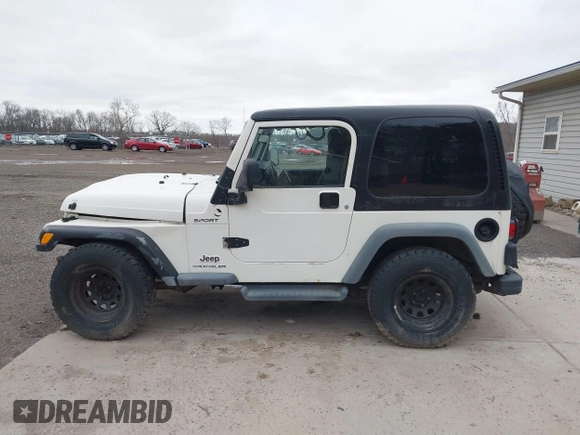 2005 Jeep Wrangler Sport with VIN 1J4FA49S25P352170, listed as a IAAI auction lot 41794958 with 154,304 mi miles. Bid and sale history available at carsss.com. Image 15.