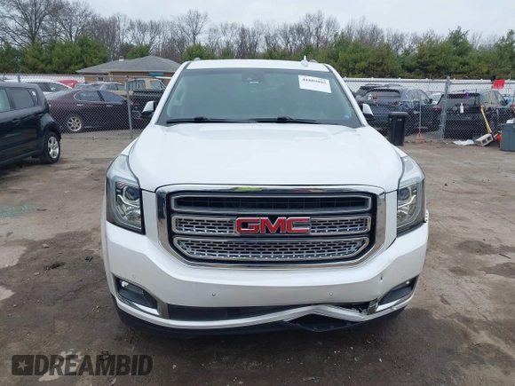 2016 GMC Yukon SLT with VIN 1GKS2BKC5GR374815, listed as a IAAI auction lot 41889495 with 163,464 mi miles. Bid and sale history available at carsss.com. Image 13.