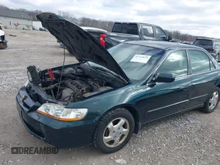 2000 Honda Accord EX z VIN JHMCG5659YC001925, wystawiony jako IAAI lot #41715654 z przebiegiem 190 605 mil mil oraz . Historia ofert i sprzedaży dostępna na DreamBid. Obrazek 6.