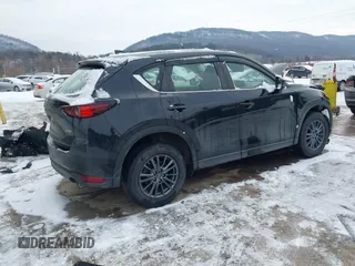 2019 Mazda CX-5 Sport with VIN JM3KFBBM8K1621929, listed as a IAAI auction lot 41356228 with 67,023 mi miles and . Bid and sale history available at DreamBid. Image 4.