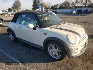 2007 MINI Convertible S with VIN WMWRH33567TL94957, listed as a Copart auction lot 42127775 with 90,401 mi miles and Salvage title. Bid and sale history available at DreamBid. Image 4.