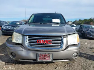 2007 GMC Envoy SLE with VIN 1GKDS13S372241844, listed as a IAAI auction lot 41575443 with 144,726 mi miles. Bid and sale history available at carsss.com. Image 12.