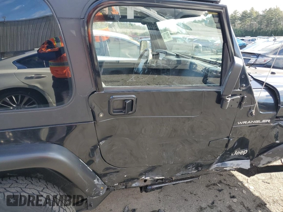 2002 Jeep Wrangler SE with VIN 1J4FA29P82P732805, listed as a Copart auction lot 86017044 with 138,679 mi miles and Salvage Title. Bid and sale history available at DreamBid. Image 10.