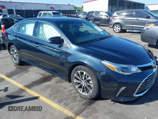 2018 Toyota Avalon XLE with VIN 4T1BK1EB5JU283116, listed as a IAAI auction lot 41979113 with 83,714 mi miles. Bid and sale history available at carsss.com. Image 1.