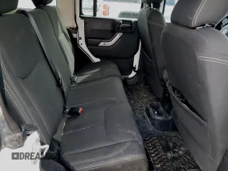 2017 Jeep Wrangler Unlimited Rubicon z VIN 1C4BJWFG5HL511601, wystawiony jako Copart lot #48223945 z przebiegiem 86 465 mil mil oraz Szkoda całkowita • Salvage title. Historia ofert i sprzedaży dostępna na DreamBid. Obrazek 11.