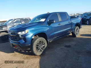 2023 Chevrolet Silverado 1500 LT Trail Boss with VIN 3GCUDFE8XPG152588, listed as a IAAI auction lot 41824795 with 21,903 mi miles and . Bid and sale history available at DreamBid. Image 2.