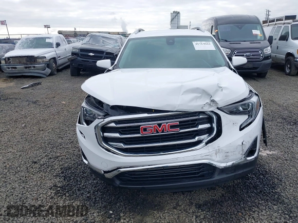 2020 GMC Terrain SLT z VIN 3GKALVEVXLL143417, wystawiony jako IAAI lot #41714662 z przebiegiem 97 634 mil mil oraz . Historia ofert i sprzedaży dostępna na DreamBid. Obrazek 12.