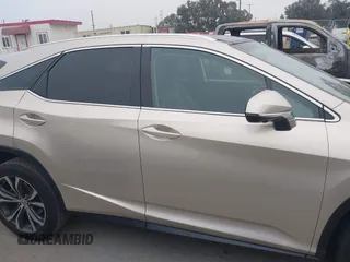 2016 Lexus RX 350 z VIN 2T2ZZMCA7GC026468, wystawiony jako IAAI lot #42433640 z przebiegiem 91 376 mil mil oraz . Historia ofert i sprzedaży dostępna na DreamBid. Obrazek 14.