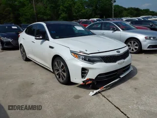 2016 Kia Optima SXL Turbo with VIN 5XXGV4L26GG015874, listed as a IAAI auction lot 42127366 with 166,970 mi miles. Bid and sale history available at carsss.com. Image 1.