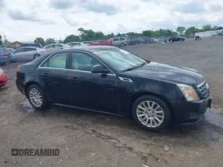 2012 Cadillac CTS with VIN 1G6DC5E52C0116219, listed as a IAAI auction lot 42463440 with 190,818 mi miles and . Bid and sale history available at DreamBid. Image 13.