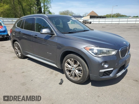 2017 BMW X1 xDrive28i z VIN WBXHT3Z37H4A54544, wystawiony jako Copart lot #55019535 z przebiegiem 76 822 mil mil oraz Szkoda całkowita • Salvage title. Historia ofert i sprzedaży dostępna na DreamBid. Obrazek 4.