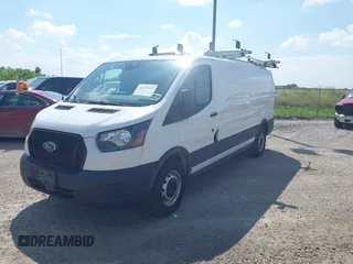 2021 Ford Transit Cargo with VIN 1FTYE1Y80MKA75151, listed as a IAAI auction lot 42577609 with 91,623 mi miles and . Bid and sale history available at DreamBid. Image 17.