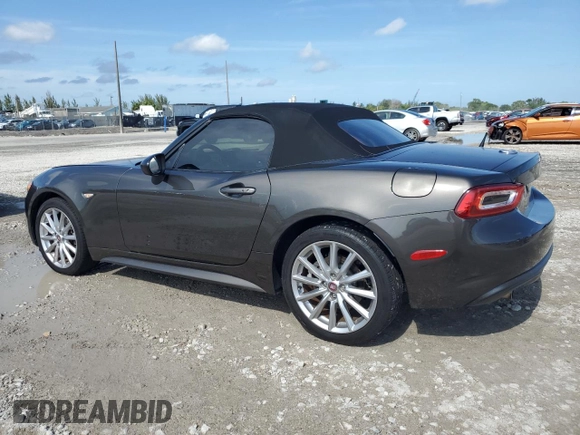 2017 FIAT 124 Spider Lusso z VIN JC1NFAEK7H0123436, wystawiony jako Copart lot #56169965 z przebiegiem 133 320 mil mil oraz Czysty tytuł • Clean title. Historia ofert i sprzedaży dostępna na DreamBid. Obrazek 2.