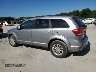 2017 Dodge Journey SXT with VIN 3C4PDCBG2HT521671, listed as a Copart auction lot 52565935 with 116,440 mi miles and Salvage Title. Bid and sale history available at DreamBid. Image 2.