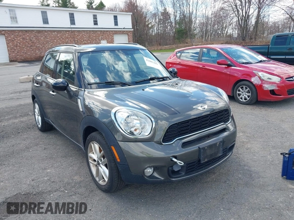 2014 MINI Countryman S with VIN WMWZC3C58EWP27041, listed as a IAAI auction lot 42082489 with 77,749 mi miles and . Bid and sale history available at DreamBid. Image 12.
