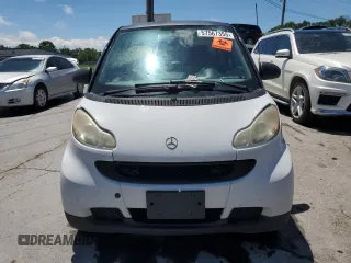 2009 Smart fortwo Pure z VIN WMEEJ31X99K218439, wystawiony jako Copart lot #57567355 z przebiegiem 157 281 mil mil oraz Szkody całkowita. Historia ofert i sprzedaży dostępna na DreamBid. Obrazek 5.