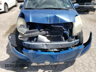 2009 Toyota Yaris with VIN JTDKT903895237298, listed as a Copart auction lot 50908243 with 117,668 mi miles and Salvage Title. Bid and sale history available at carsss.com. Image 12.