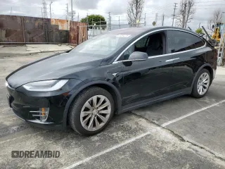 2018 Tesla Model X 75D with VIN 5YJXCBE24JF130216, listed as a Copart auction lot 48894215 with 75,694 mi miles and Salvage Title. Bid and sale history available at carsss.com. Image 1.