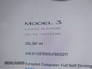 2020 Tesla Model 3 Long Range with VIN 5YJ3E1EB0LF803217, listed as a IAAI auction lot 41871940 with 130,391 mi miles. Bid and sale history available at carsss.com. Image 15.