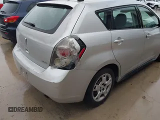 2009 Pontiac Vibe 1SB z VIN 5Y2SP67069Z412302, wystawiony jako IAAI lot #42282155 z przebiegiem 210 288 mil mil oraz . Historia ofert i sprzedaży dostępna na DreamBid. Obrazek 6.
