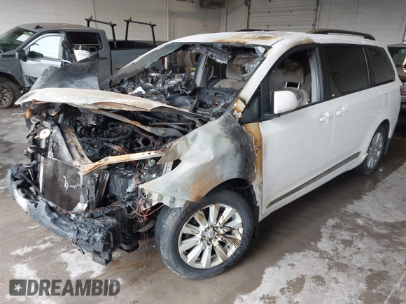 2017 Toyota Sienna LE with VIN 5TDJZ3DC5HS180200, listed as a IAAI auction lot 42204077 with 114,726 mi miles and . Bid and sale history available at DreamBid. Image 2.