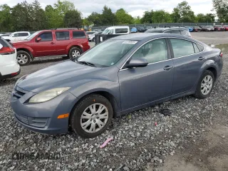 2009 Mazda 6 i Sport with VIN 1YVHP81A195M29954, listed as a Copart auction lot 55700805 with 127,477 mi miles and Clean title. Bid and sale history available at DreamBid. Image 1.