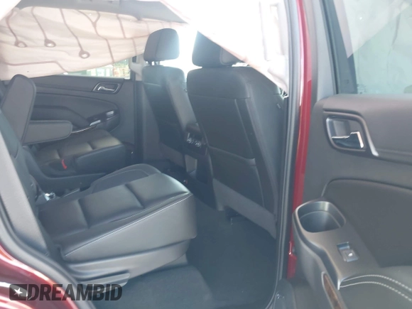 2018 Chevrolet Tahoe LT with VIN 1GNSCBKC5JR385935, listed as a IAAI auction lot 42116288 with 50,890 mi miles and . Bid and sale history available at DreamBid. Image 8.
