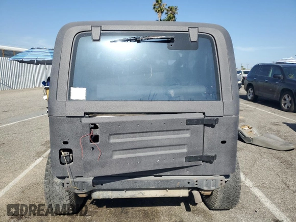1993 Jeep Wrangler z VIN 1J4FY29S4PP232079, wystawiony jako Copart lot #58055335 z przebiegiem 181 076 mil mil oraz Czysty tytuł • Clean title. Historia ofert i sprzedaży dostępna na DreamBid. Obrazek 6.