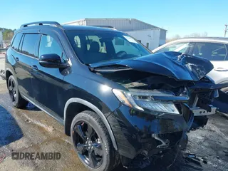 2019 Honda Passport Elite z VIN 5FNYF8H01KB006754, wystawiony jako IAAI lot #41900577 z przebiegiem 100 243 mil mil oraz . Historia ofert i sprzedaży dostępna na DreamBid. Obrazek 1.