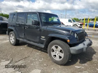 2007 Jeep Wrangler Unlimited Sahara with VIN 1J4GA59197L121262, listed as a Copart auction lot 61551685 with 233,309 mi miles and Clean title. Bid and sale history available at DreamBid. Image 4.