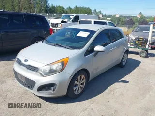 2013 Kia Rio SX with VIN KNADN5A32D6120598, listed as a IAAI auction lot 42342103 with 121,081 mi miles and . Bid and sale history available at DreamBid. Image 2.