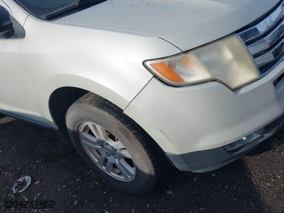 2007 Ford Edge SEL with VIN 2FMDK48C57BA30763, listed as a IAAI auction lot 41865685 with 999,999 mi miles. Bid and sale history available at carsss.com. Image 6.