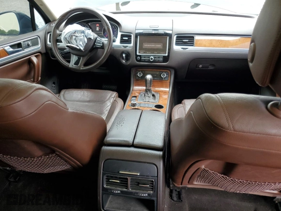 2012 Volkswagen Touareg Sport z VIN WVGEF9BP7CD009824, wystawiony jako Copart lot #58311915 z przebiegiem 154 397 mil mil oraz Szkoda całkowita • Salvage title. Historia ofert i sprzedaży dostępna na DreamBid. Obrazek 8.