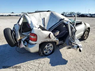1998 Kia Sportage with VIN KNDJB7232W5569054, listed as a Copart auction lot 82756824 with 106,550 mi miles and Salvage Title. Bid and sale history available at carsss.com. Image 3.