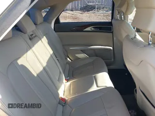 2016 Lincoln MKZ z VIN 3LN6L2J94GR611830, wystawiony jako IAAI lot #41264148 z przebiegiem 155 065 mil mil oraz . Historia ofert i sprzedaży dostępna na DreamBid. Obrazek 8.