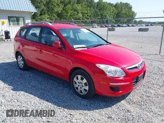 2011 Hyundai Elantra Touring GLS with VIN KMHDC8AE1BU113819, listed as a IAAI auction lot 40357801 with 111,336 mi miles. Bid and sale history available at carsss.com. Image 1.