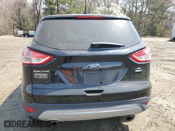 2013 Ford Escape SE with VIN 1FMCU9GX7DUD90307, listed as a Copart auction lot 54527485 with 64,995 mi miles and Clean title. Bid and sale history available at DreamBid. Image 6.