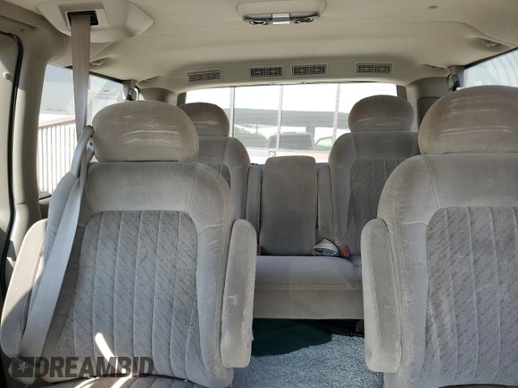 2003 GMC Safari z VIN 1GKEL19X03B503236, wystawiony jako Copart lot #71755844 z przebiegiem 109 438 mil mil oraz Szkody całkowita. Historia ofert i sprzedaży dostępna na DreamBid. Obrazek 10.
