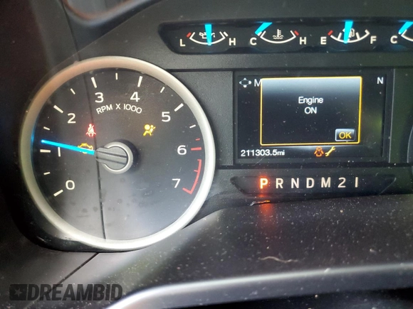 2016 Ford F-150 XLT with VIN 1FTFX1EG2GKF77712, listed as a Copart auction lot 45689545 with 211,303 mi miles and Salvage title. Bid and sale history available at DreamBid. Image 9.