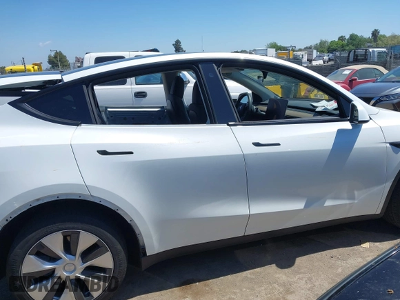 2023 Tesla Model Y Long Range with VIN 7SAYGDEE1PF660444, listed as a IAAI auction lot 42065046 with 23,601 mi miles and . Bid and sale history available at DreamBid. Image 14.